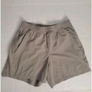 Lululemon Shorts Men SZ M Pace Breaker Linerless 5" Athleisure Gym M7B86S Tan